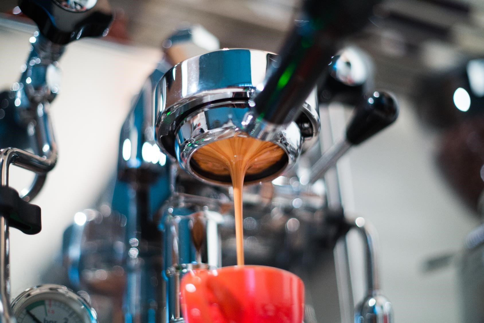 Espresso machine brewing a coffee. Coffee pouring into two shot